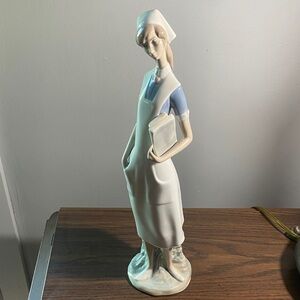 Lladro Porcelain Nurse Figurine in White and Light Blue